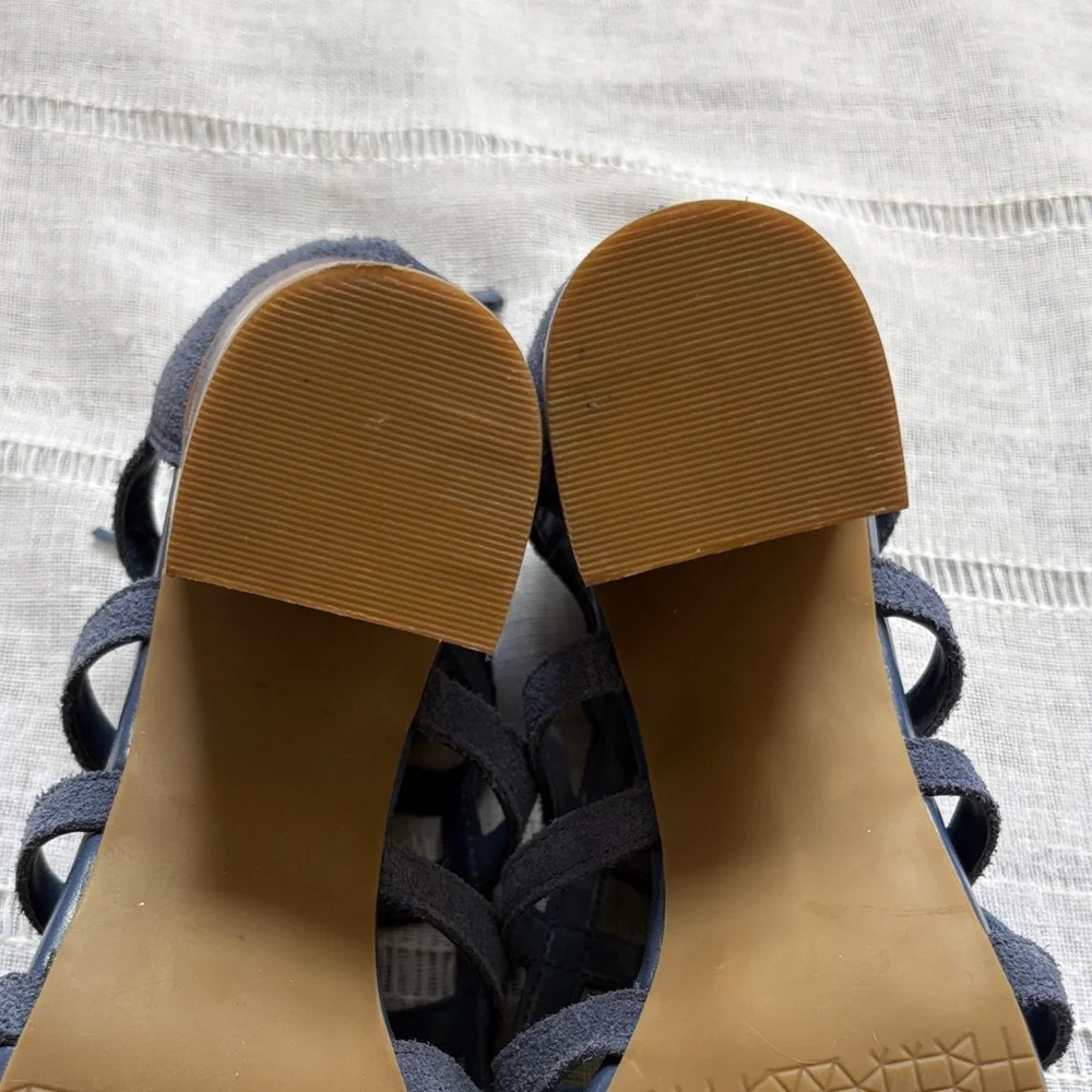 Aubrey Lynn blue suede gladiator-style heels with a tie and zip closure